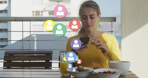 Woman Capturing Morning Meal on Smartphone with Social Media Icons