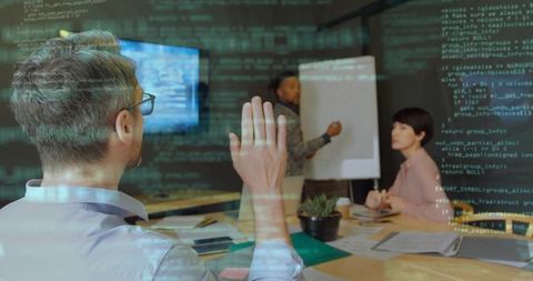 Team Lead Presenting Code in Collaborative Office Meeting