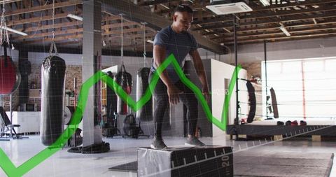 Athlete Performing Plyometric Box Jumps in Industrial Boxing Gym for Functional Fitness and Agility
