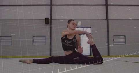 Teen Gymnast Stretching in Modern Gym with Digital Graphics Overlay