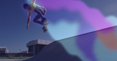 Skateboarder Performing Trick with Vibrant Light Effects