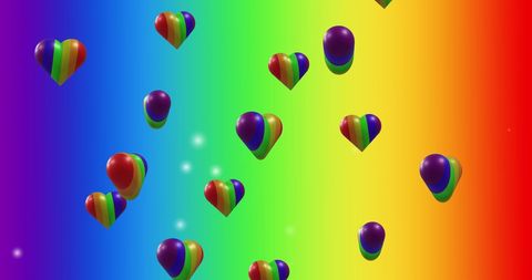 Rainbow Hearts Floating on Vivid Gradient Background Celebrating Unity