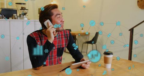 Businessman Connecting Digitally in Modern Office Café