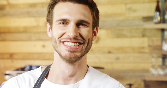 Smiling Young Male Chef in Rustic Kitchen - Download Free Stock Images Pikwizard.com