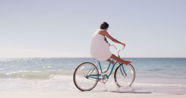 Woman Enjoying Summer With Bicycle on Beach - Download Free Stock Images Pikwizard.com