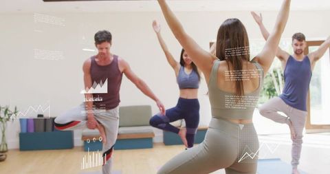 Group yoga class with instructor leading tree pose and ar fitness analytics overlays
