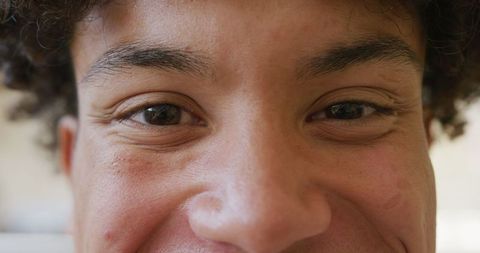Closeup of Smiling Biracial Man at Joyful Wedding
