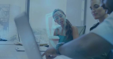 Collaborating Professionals in Modern Office Environment