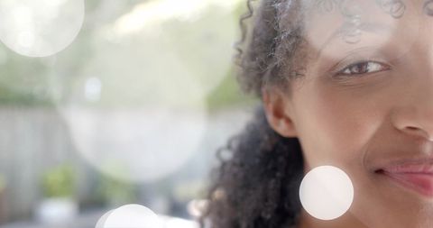 Half Portrait of Smiling Teen Girl in Sunlit Garden