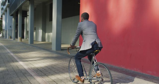 Businessman Commuting to Work on Bicycle in City - Download Free Stock Images Pikwizard.com