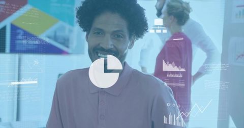 Smiling professional with dashboard overlays showing data visualization in modern office