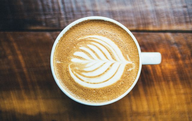 Close-up of Latte Art on Hot Cappuccino - Download Free Stock Photos Pikwizard.com