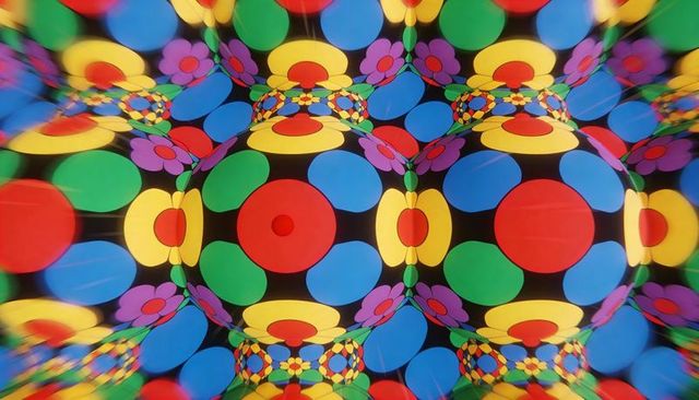 Creating kaleidoscopic flower tessellation with vibrant retro optical circles and ovals