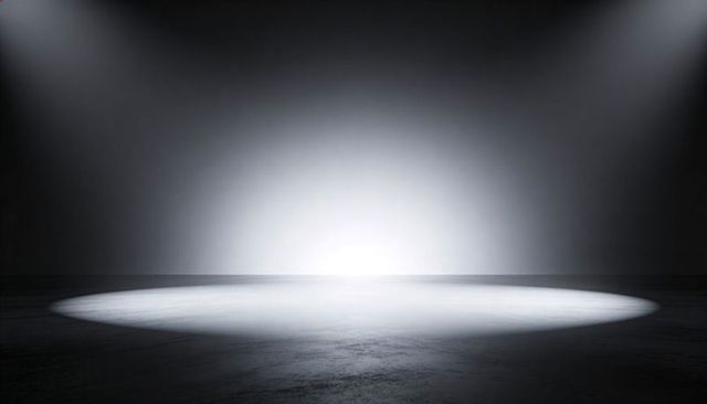 Empty Concrete Stage Featuring Circular Spotlight and Dramatic Overhead Beams