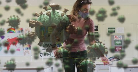 Healthcare Worker Interacting with Coronavirus Hologram in Classroom