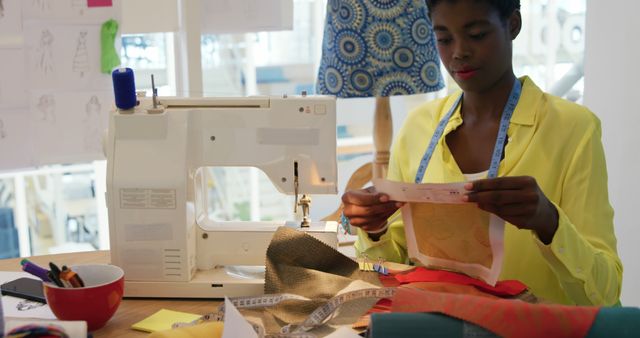 Fashion Designer Reviewing Fabric Samples in Studio - Download Free Stock Images Pikwizard.com