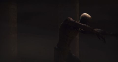 Zombie mummy in dark crypt suggesting fear and horror