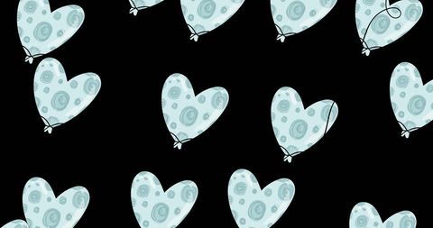 Heart-Shaped Polka Dot Balloons on Black Background