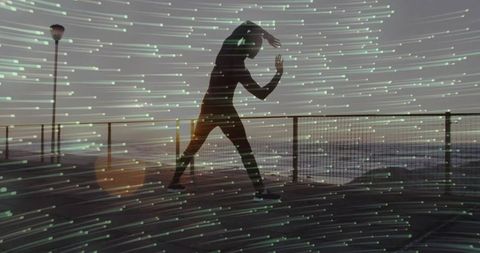 Adult Man Practicing Martial Pose Outdoor at Dawn