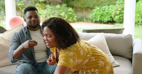 Thoughtful african american couple having heartfelt dialogue