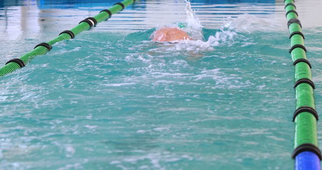 Swimmer in Action in Lap Pool Training - Download Free Stock Images Pikwizard.com