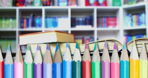 Colorful Pencils and Books in Vibrant School Library - Download Free Stock Images Pikwizard.com