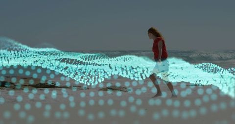 Walking woman on shoreline with glowing turquoise data wave overlay, barefoot motion