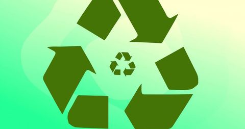 Recycling symbols on green gradient background