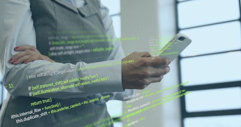 tech professional engaging with data on smartphone in modern office - Download Free Stock Images Pikwizard.com