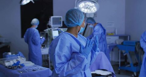 Surgical team in operating room enhancing medical precision