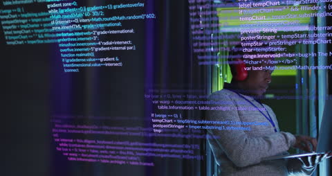 Engineer Analyzing Code with Augmented Reality Display in Server Room