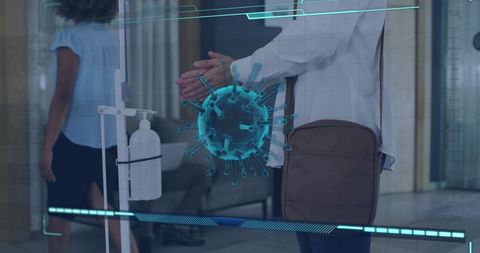 Man disinfecting hands with digital coronavirus overlay