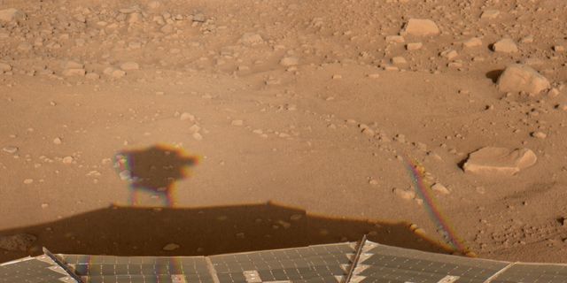 This image was acquired by NASA Phoenix Mars Lander Surface Stereo Imager SSI in the late afternoon of the 30th Martian day of the mission, or Sol 30 June 25, 2008. This is hours after the beginning of Martian northern summer.