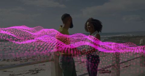 Couple by Seaside with Digital Pink Wave Overlay