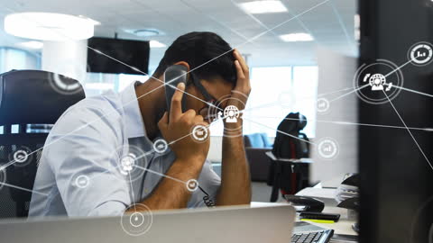Stressed Businessman in Modern Office with Digital Network