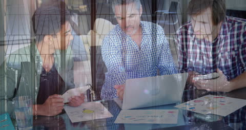 Collaborative Business Meeting with Modern Technology Overlay