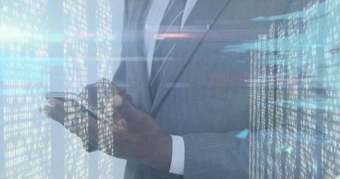 Executive using smartphone with holographic data streams and digital analytics overlay