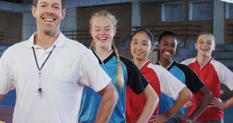 Dedicated Coach Leading Diverse Girls' Volleyball Team