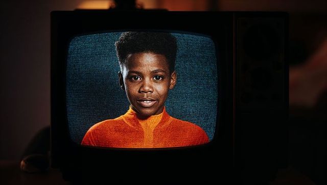Nostalgic Young Boy's Portrait on Vintage CRT Television