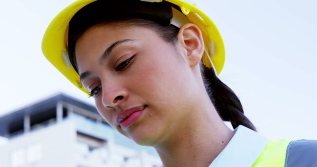 Biracial Female Architect Wearing Hard Hat Deep in Thought - Download Free Stock Images Pikwizard.com