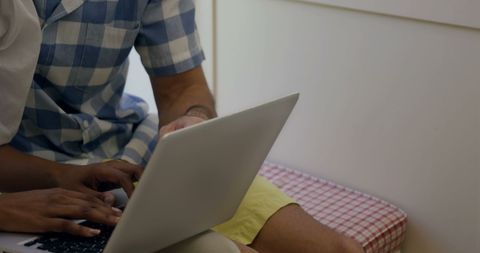 Team Collaboration on Laptop for Projects and Meetings