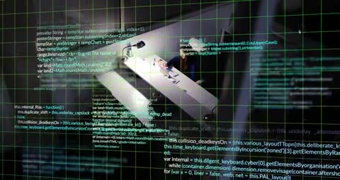 Adult woman studying with laptop and notes under green grid and code overlay, focused workspace