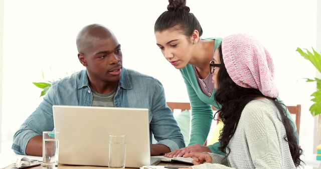 College Students Collaborating on Laptop for Group Project - Download Free Stock Images Pikwizard.com