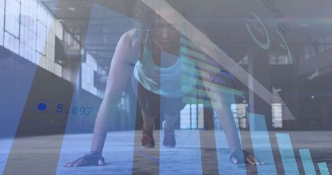 African american woman doing pushup with data overlay