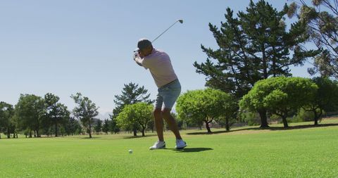 Senior Man Practicing Golf Swing on a Sunny Day - Download Free Stock Images Pikwizard.com