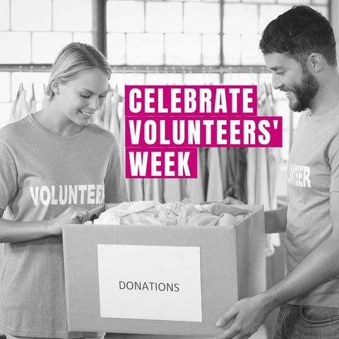 Charity Volunteers Celebrating Volunteers' Week with Donations Box