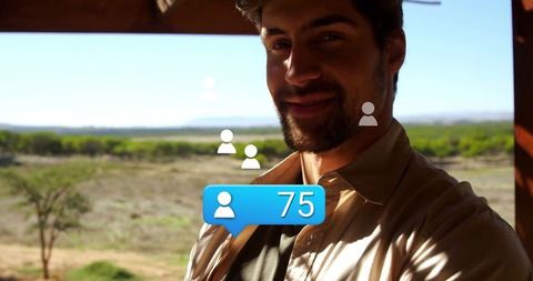 Man Taking Selfie on Veranda with Virtual Notifications in Nature