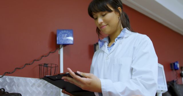 Female Doctor Reviewing Patient Notes in Clinic - Download Free Stock Images Pikwizard.com