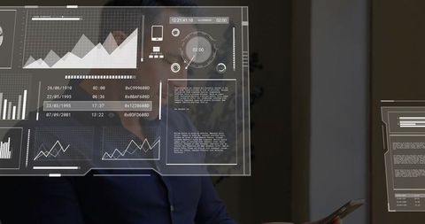 Mature executive interacting with holographic data dashboards, charts and analytics interface