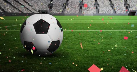 Soccer Ball on Green Field with Confetti in Stadium Celebrating Victory - Download Free Stock Images Pikwizard.com